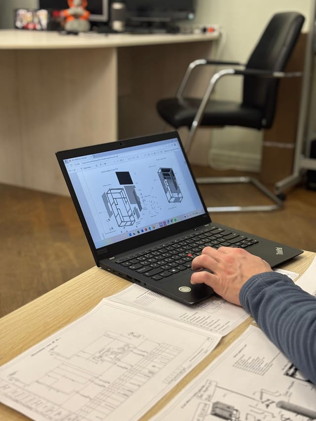 Detailed inspection report and data on a laptop screen