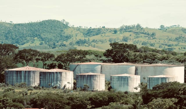 Storage tanks within a bunded secondary containment area